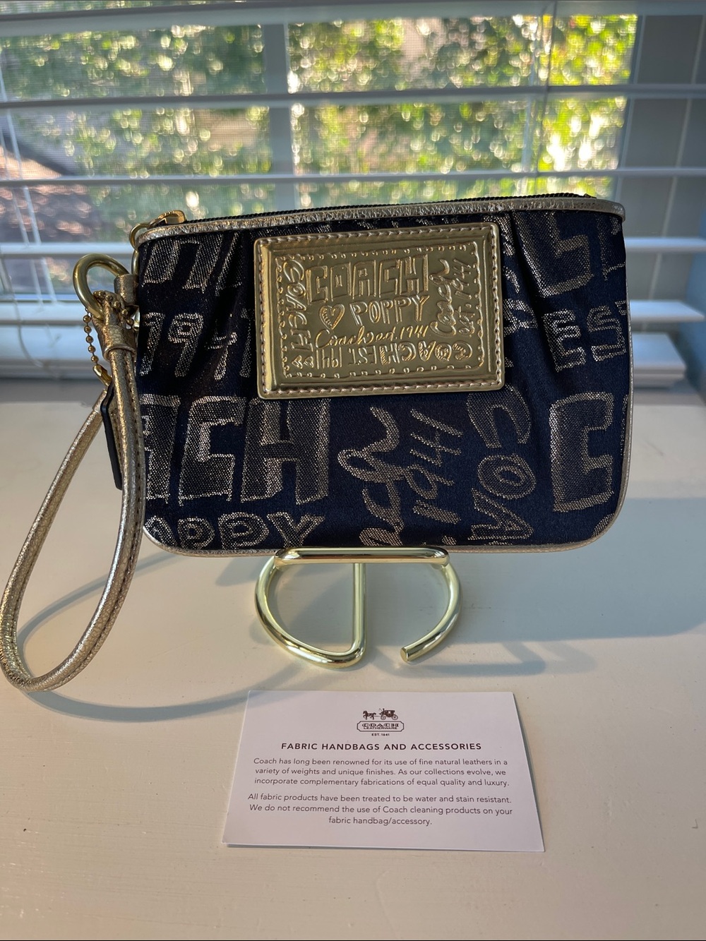 Coach Navy and Gold Logo Wristlet